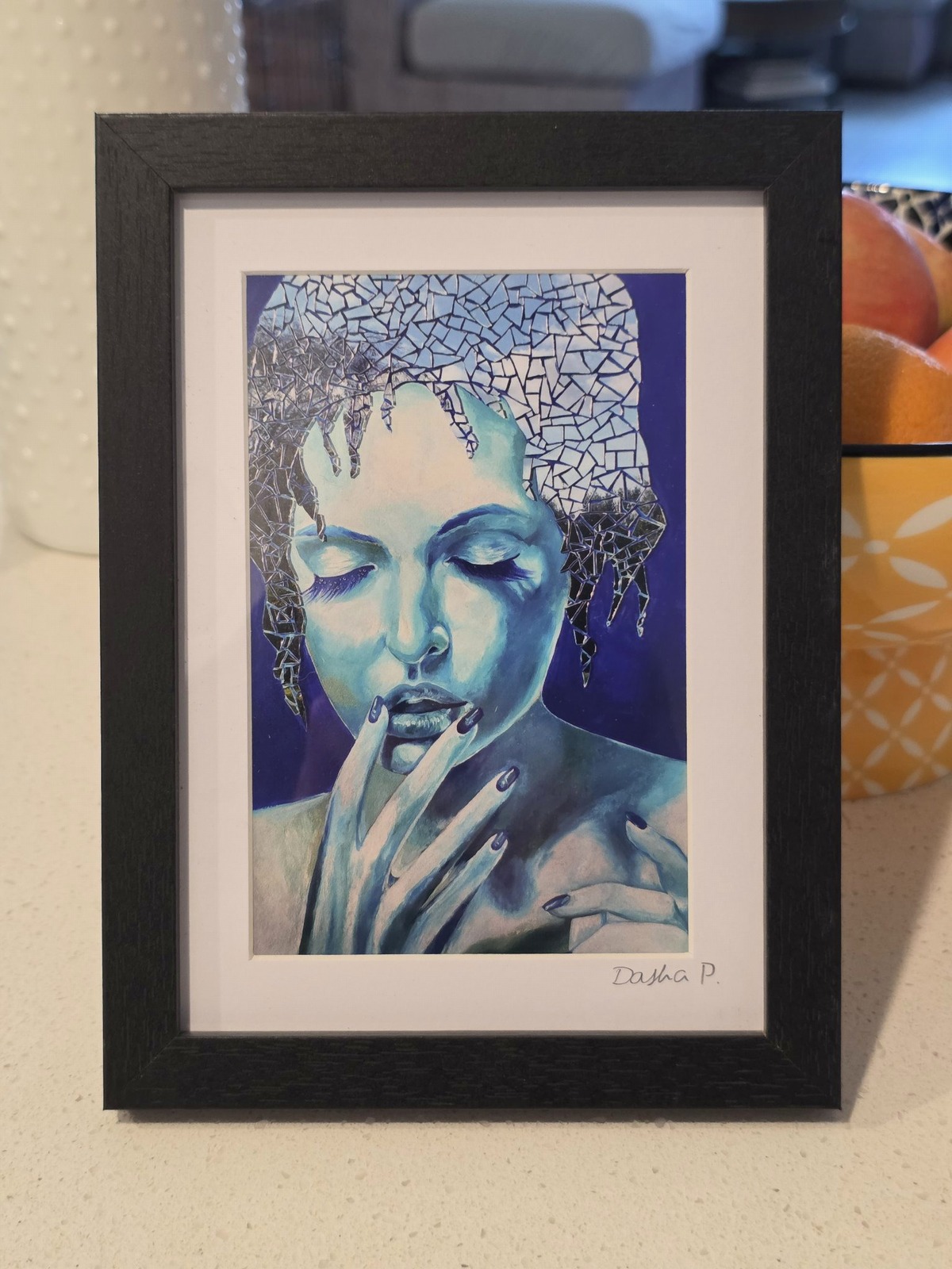Ice Queen signed matted framed art print by Dasha Prudnikova, a blue-toned portrait with mosaic-like glass details in a black frame with white mat.